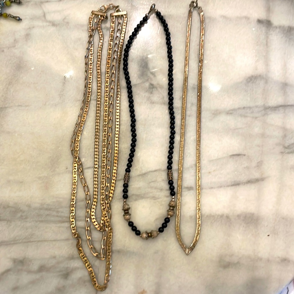 2 sterling silver necklaces.